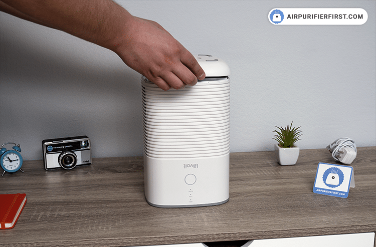 Seal the filter cover, place the air purifier in the desired location, and plug it in an outlet.